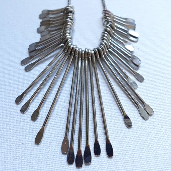 Chic Modern Silver Necklace with Unique Dangling Elements - Picture 1 of 5